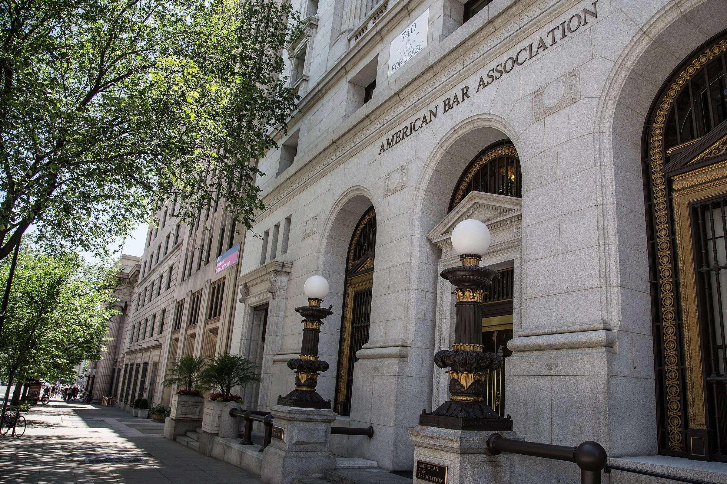 The stone facade of the American Bar Association building in Washington, D.C., with the words AMERICAN BAR ASSOCIATION carved above the arched entrance