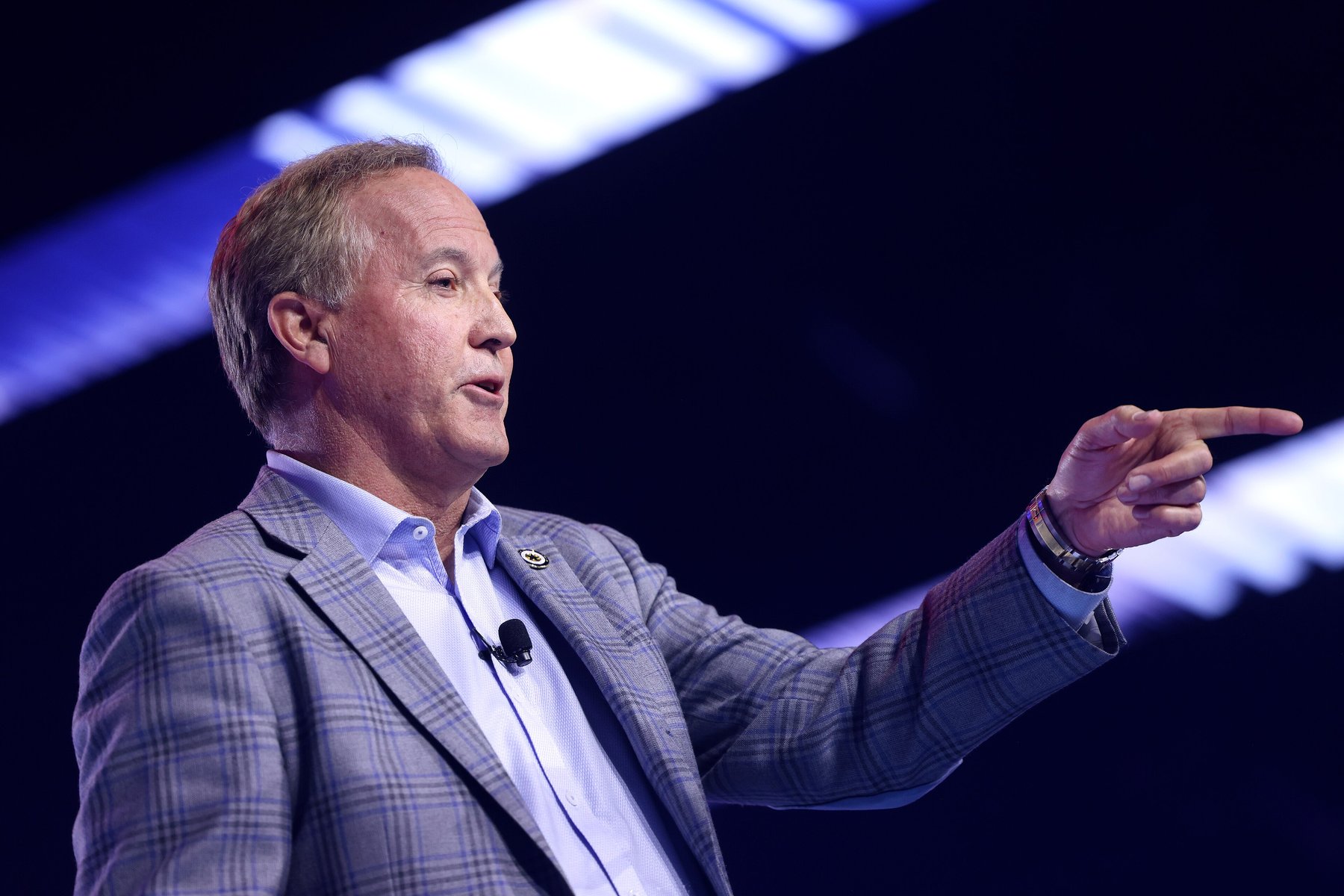 Texas Attorney General Ken Paxton speaking at AmericaFest in December 2025