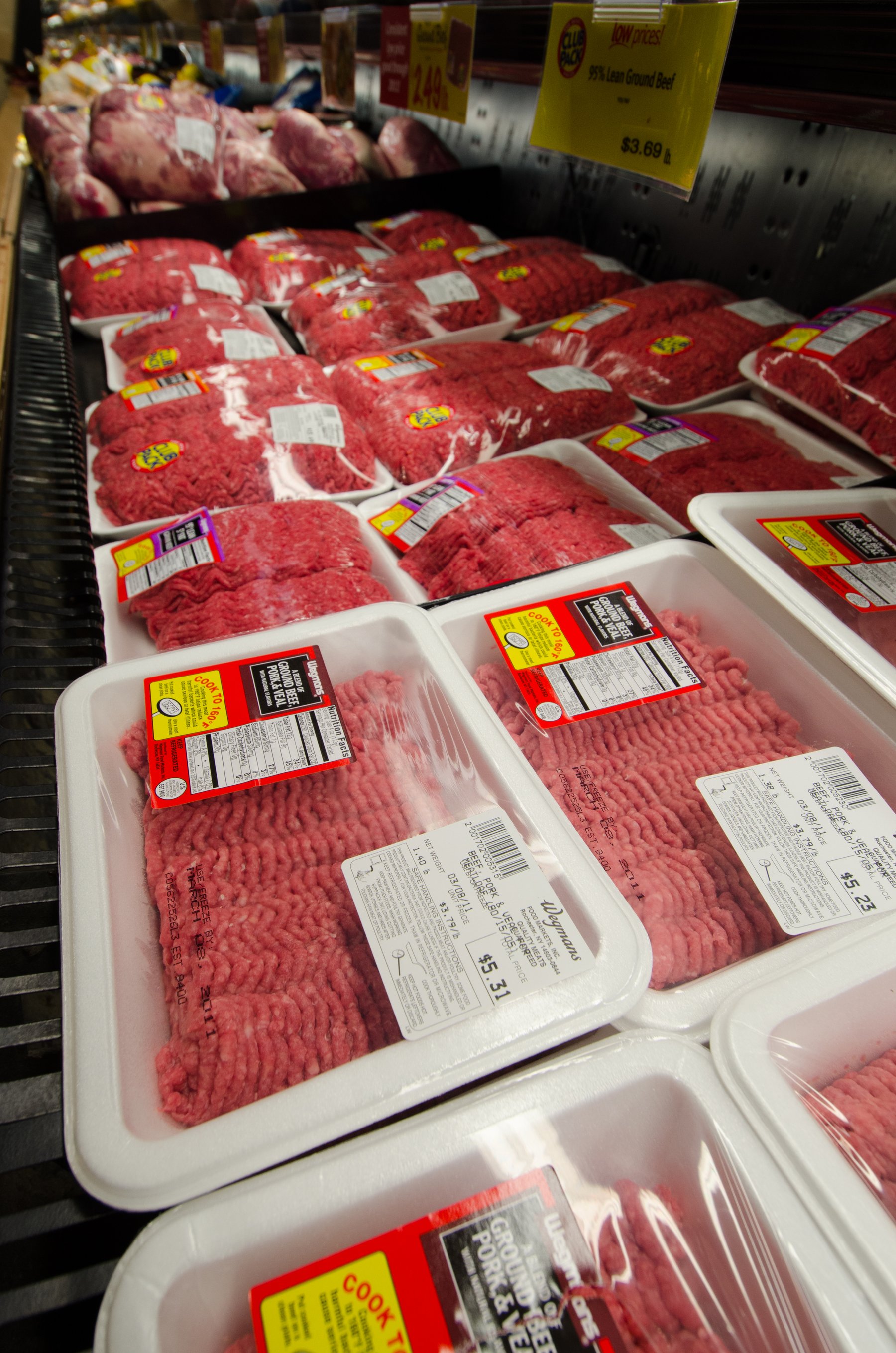 Packages of ground beef in a grocery store meat case in Fairfax, Virginia