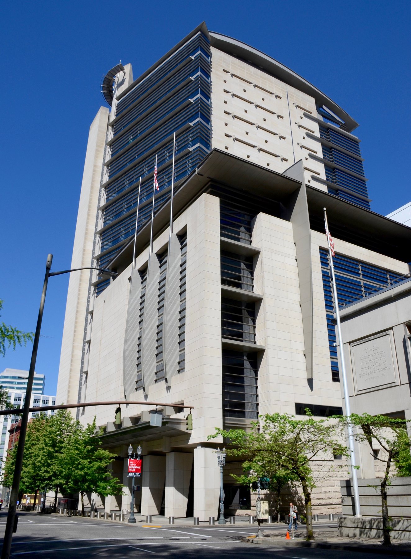 The Mark O. Hatfield United States Courthouse in downtown Portland, Oregon, a tall limestone and glass tower
