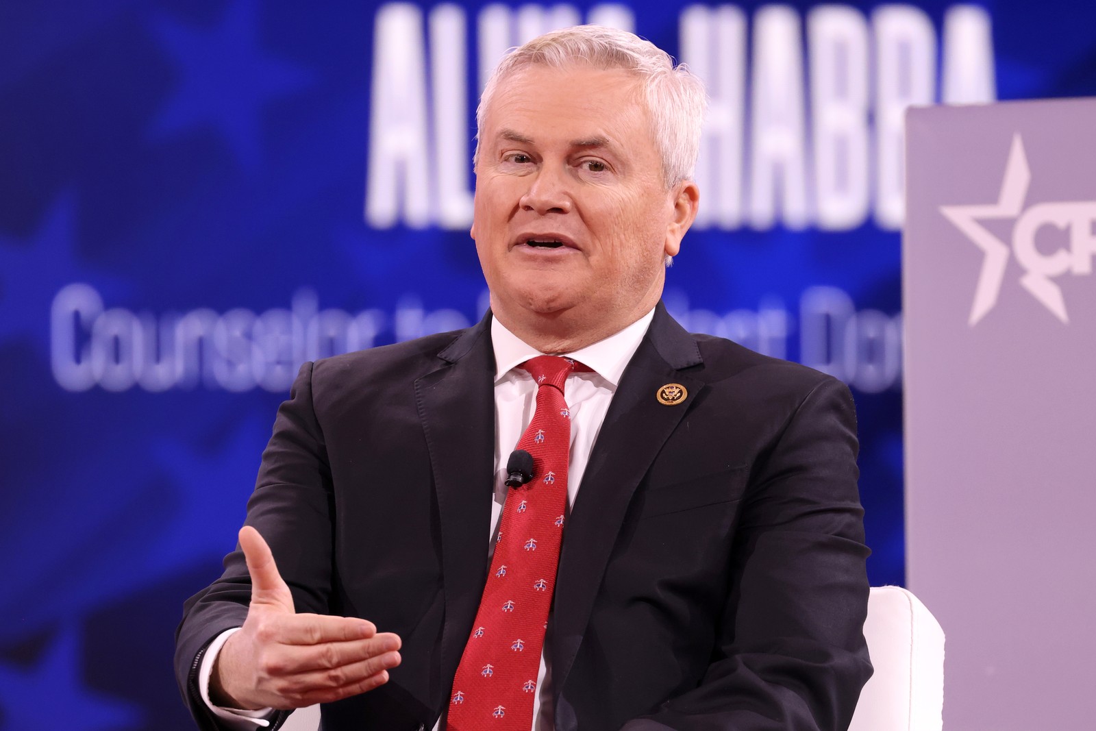 House Oversight Chairman James Comer speaking on stage at CPAC 2025