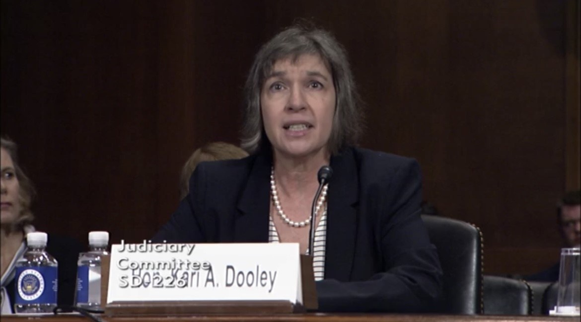 Kari A. Dooley testifying at her March 2018 Senate Judiciary Committee nomination hearing