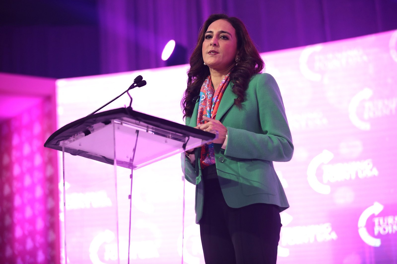 Assistant Attorney General Harmeet Dhillon speaking at a podium