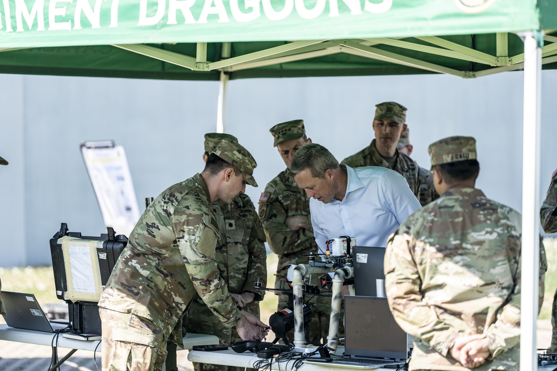 Army Secretary Dan Driscoll inspects a 2nd Cavalry Regiment Transformation in Contact equipment display alongside Gen. Christopher Donahue at Clay Kaserne, Germany