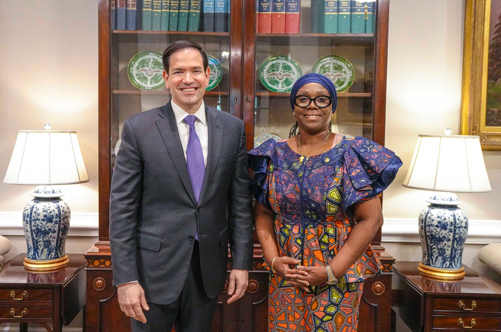 Secretary of State Marco Rubio stands with Liberian Foreign Minister Sara Beysolow Nyanti at the White House