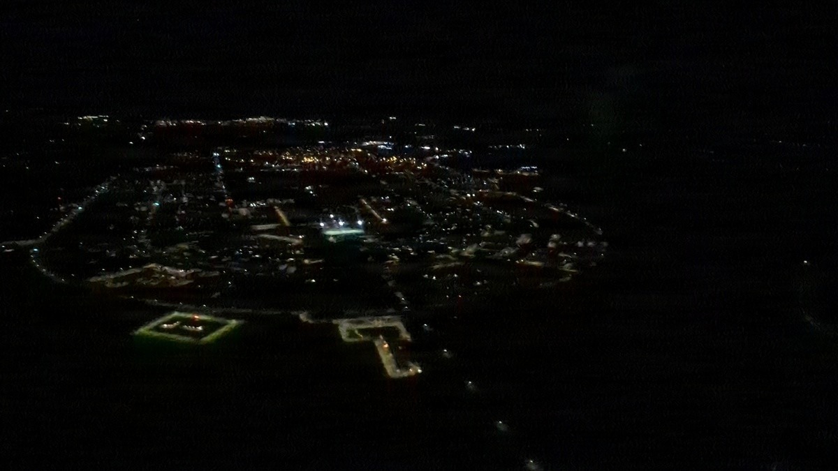 Night aerial view of the Fort Drum, New York, cantonment with lights on, taken before a 2023 energy resiliency exercise