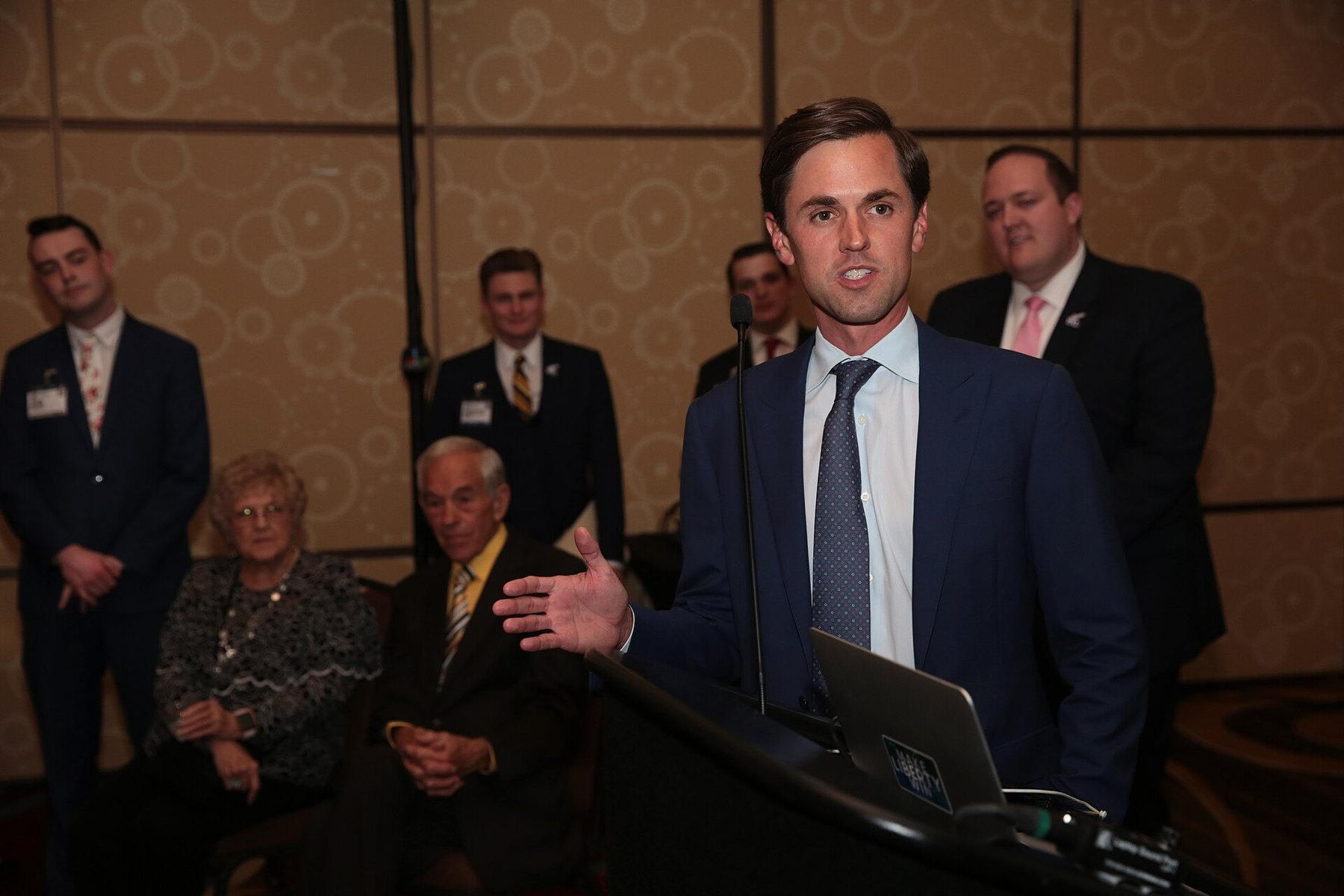 Texas state Sen. Mayes Middleton speaking at a podium at a 2018 event in Houston