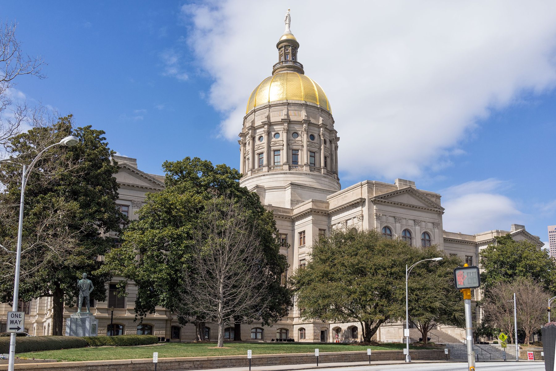 The gold-domed Georgia State Capitol in Atlanta under a blue sky