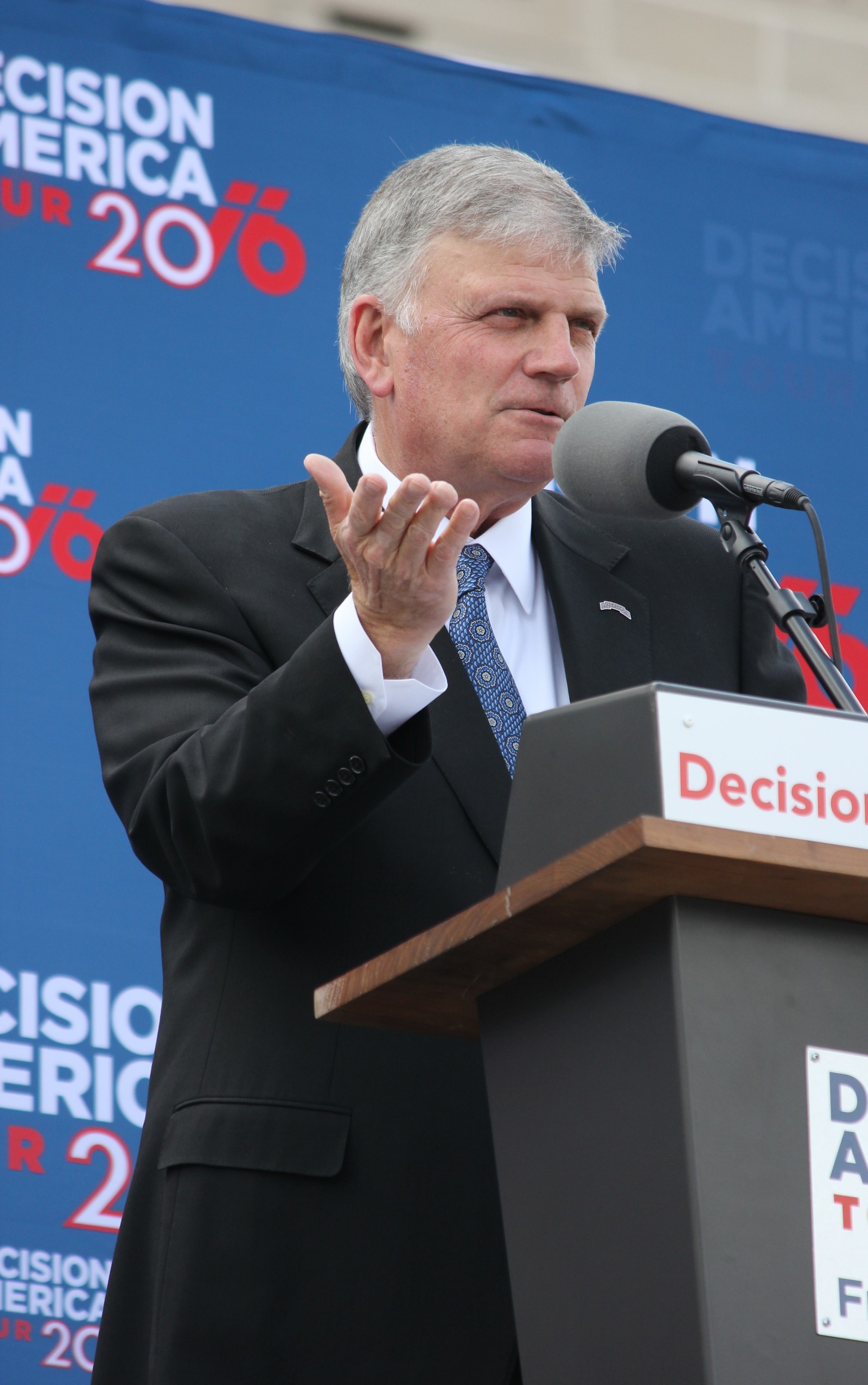 Franklin Graham speaking at a podium during his 2016 Decision America Tour stop