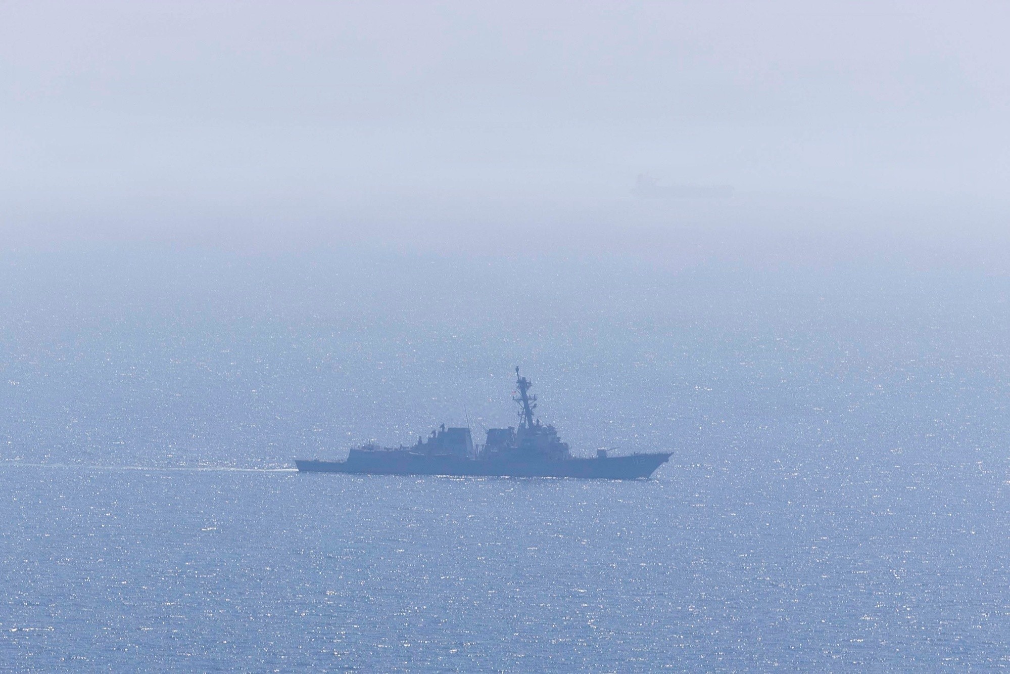 The guided-missile destroyer USS Michael Murphy patrolling the Arabian Sea in support of the U.S. blockade of Iranian ports