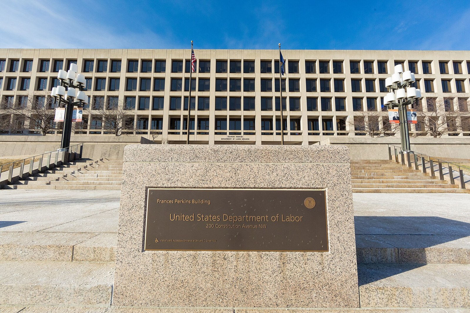 The Frances Perkins Building, headquarters of the U.S. Department of Labor, with its Constitution Avenue plaque