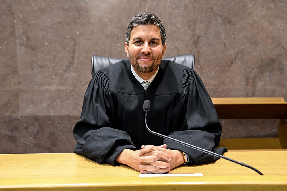 U.S. District Judge Amir Ali of the District of Columbia seated at the bench in his judicial robe