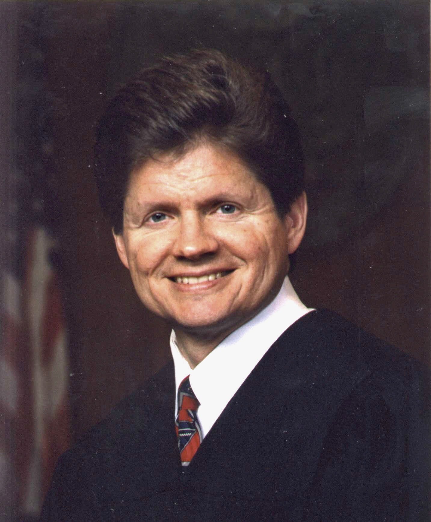 Official portrait of U.S. District Judge John R. Tunheim of the District of Minnesota in judicial robes