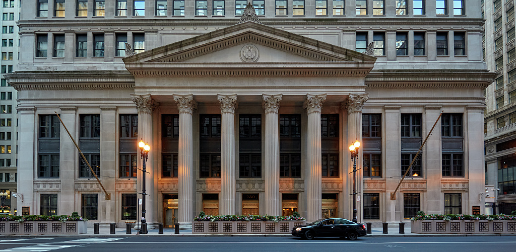 Entrance of the Federal Reserve Bank of Chicago with columns and a pediment