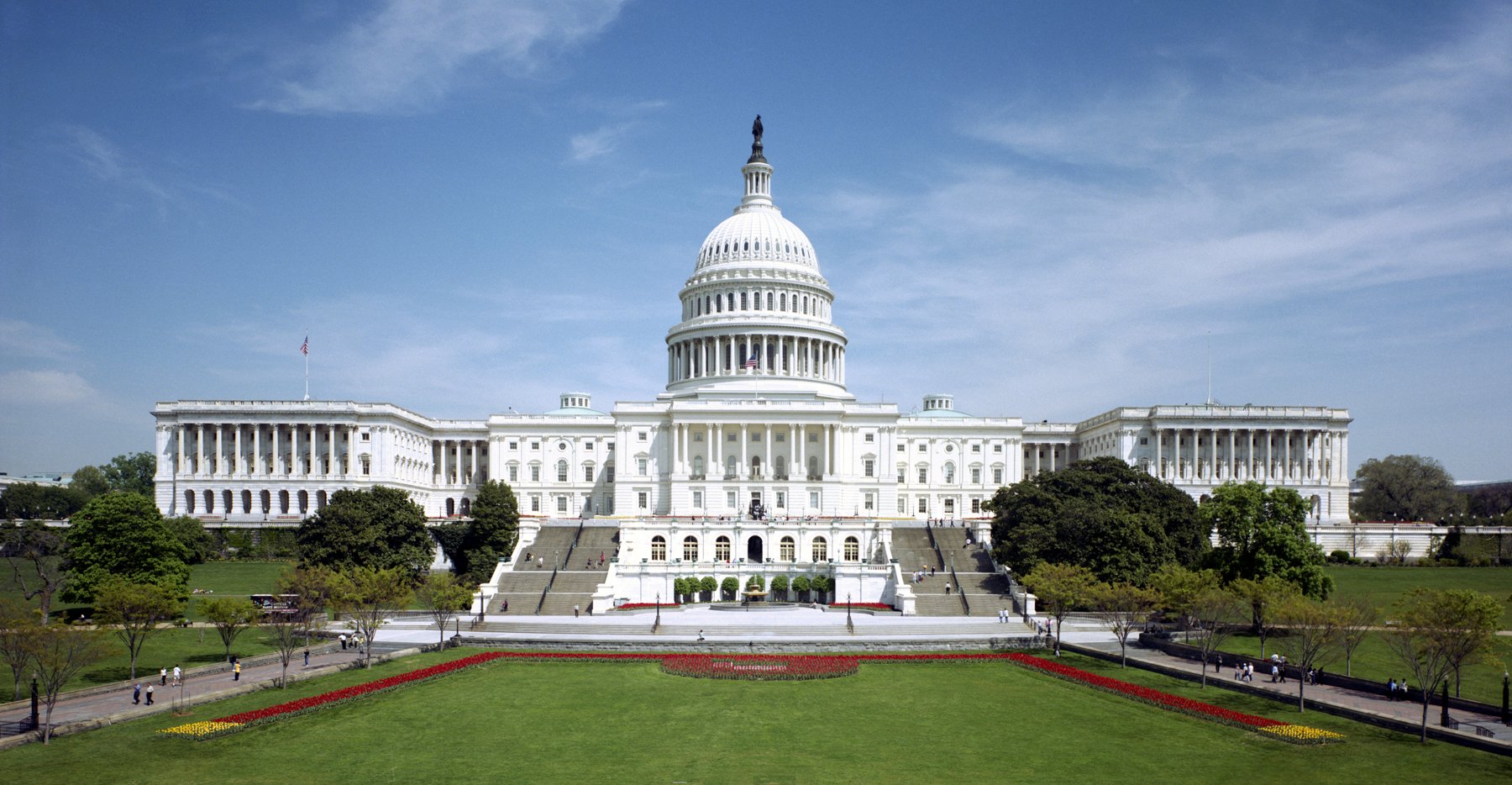 West front of the United States Capitol in Washington, D.C., under a blue sky