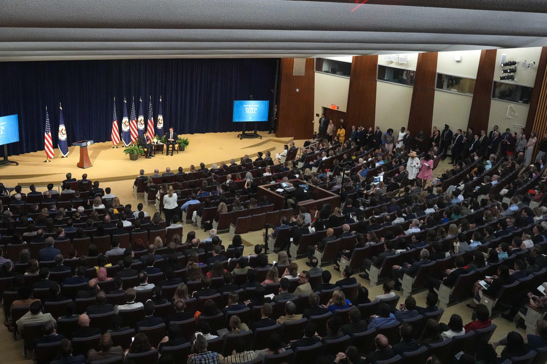 Secretary of State Marco Rubio speaks to State Department employees filling the Dean Acheson Auditorium at the Harry S. Truman Building in Washington