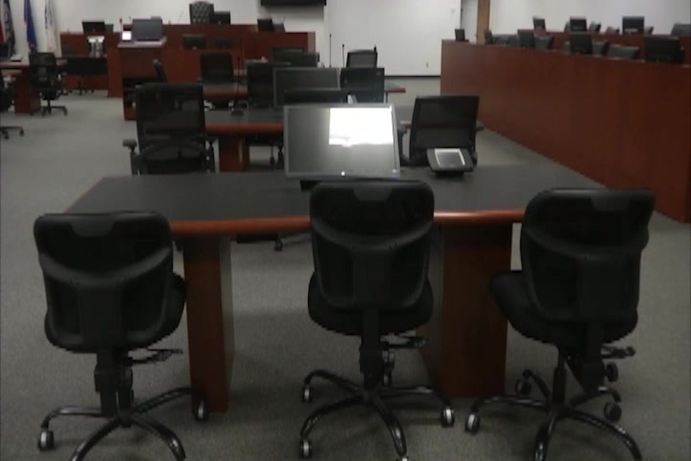 Defense counsel table inside Court Room 2 of the Expeditionary Legal Complex at Guantanamo Bay