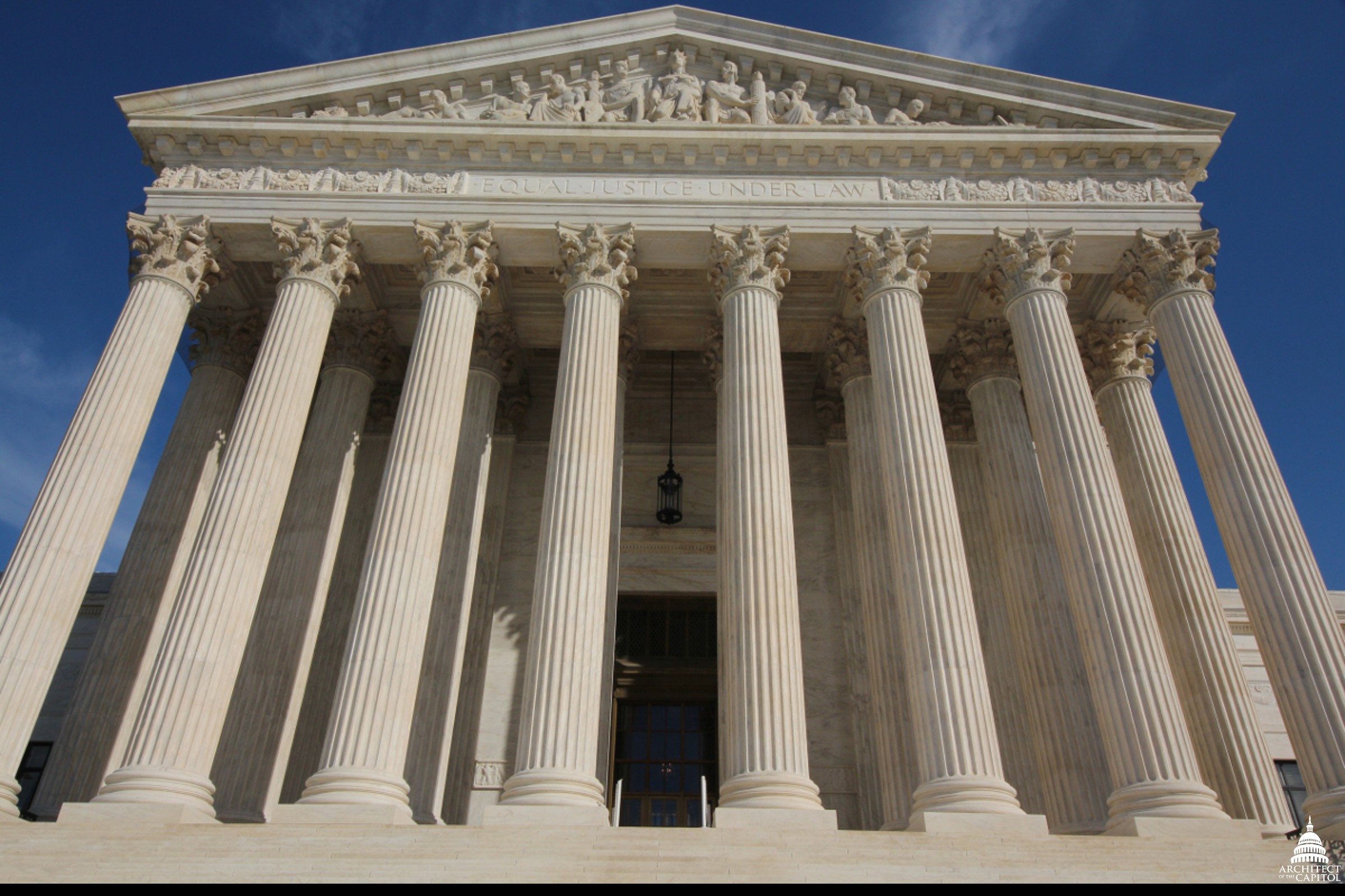 The west facade of the United States Supreme Court Building in Washington, with the Equal Justice Under Law inscription visible above the columns