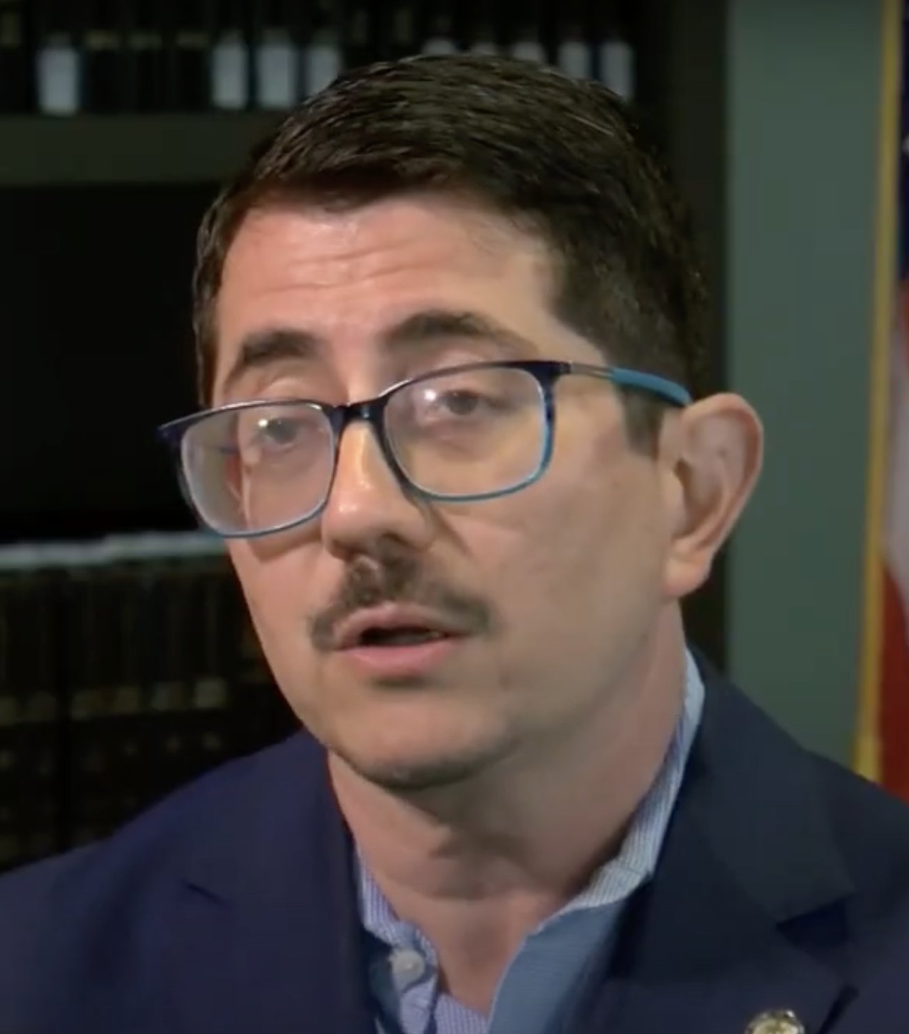 Travis County District Attorney José Garza in a television interview