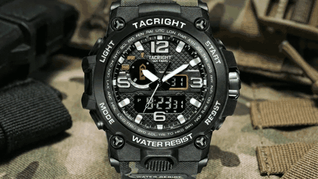 The Tacright Military Watch dial lighting up teal-green in the dark