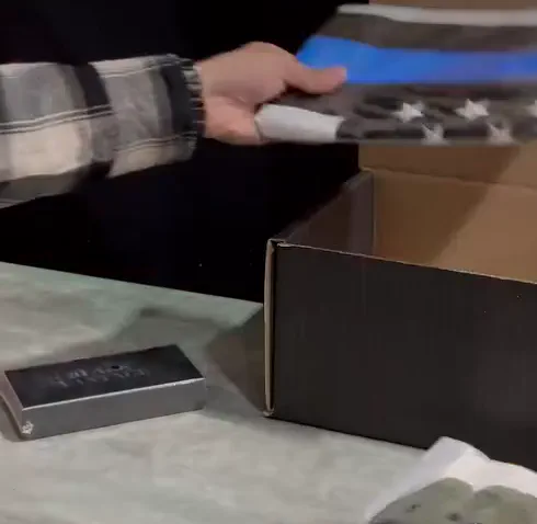 Unwrapping gear from inside a Tactical Box