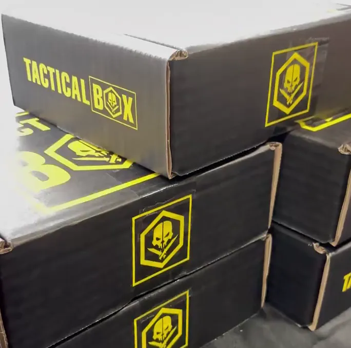 Stack of TacticalBox packages ready to ship