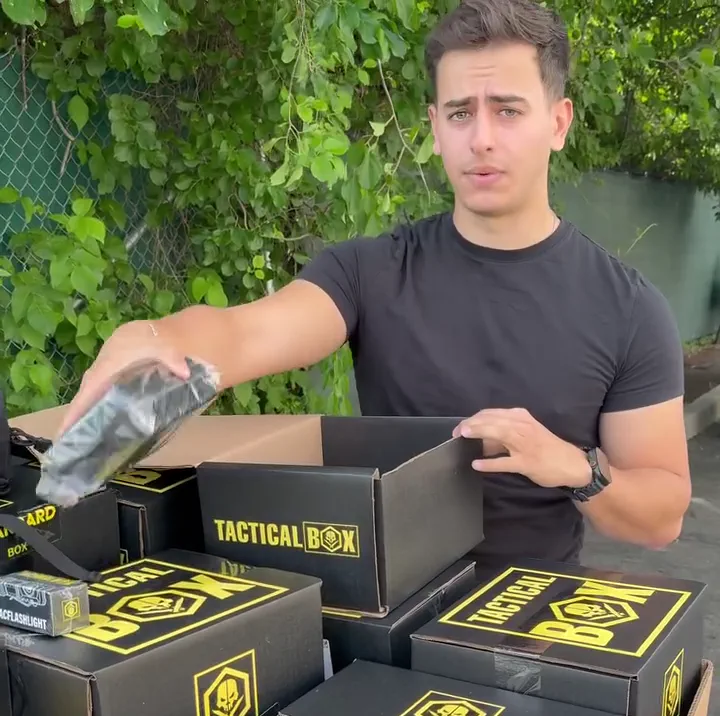 Josh from the video showing off the tactical flashlight