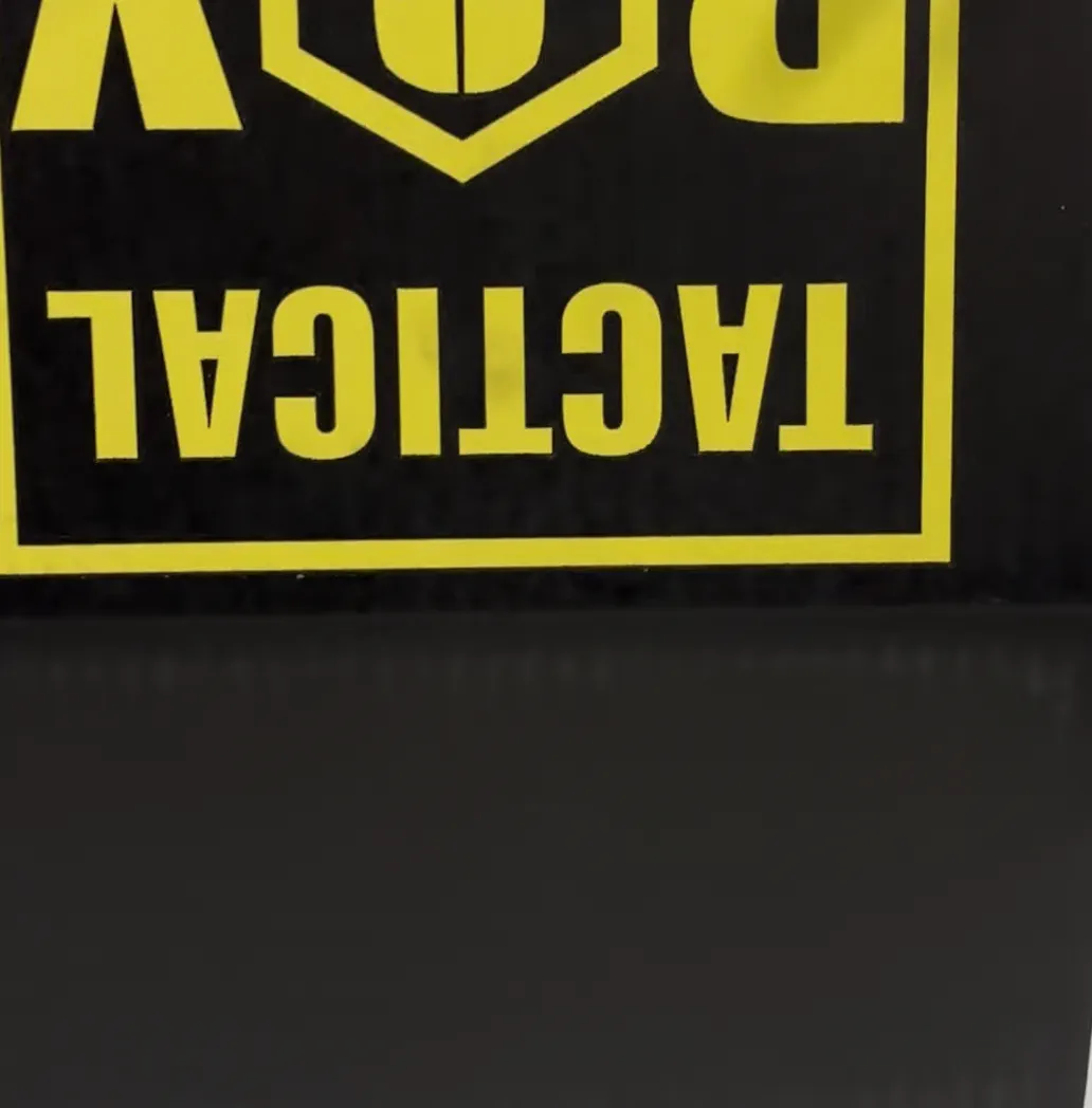 Box opened outdoors revealing packed gear