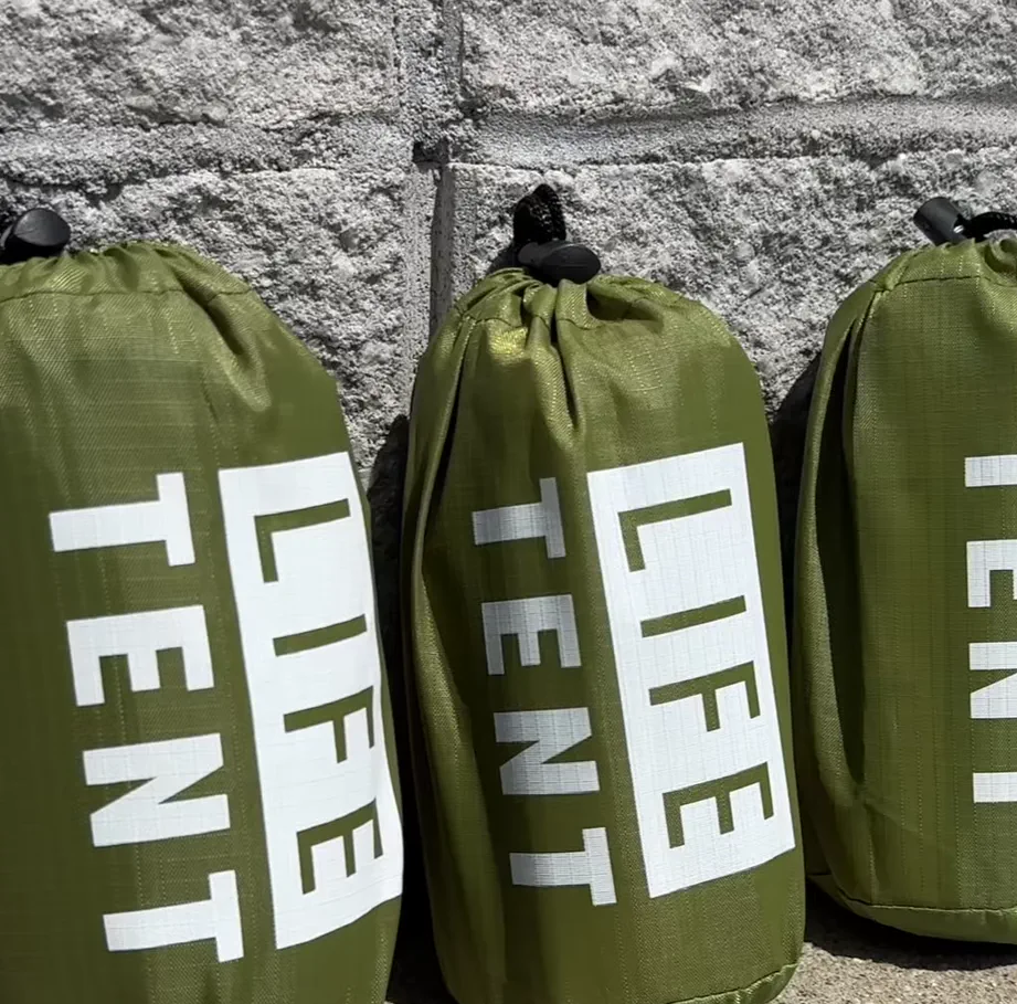 Compact survival life tent shown in the ad video