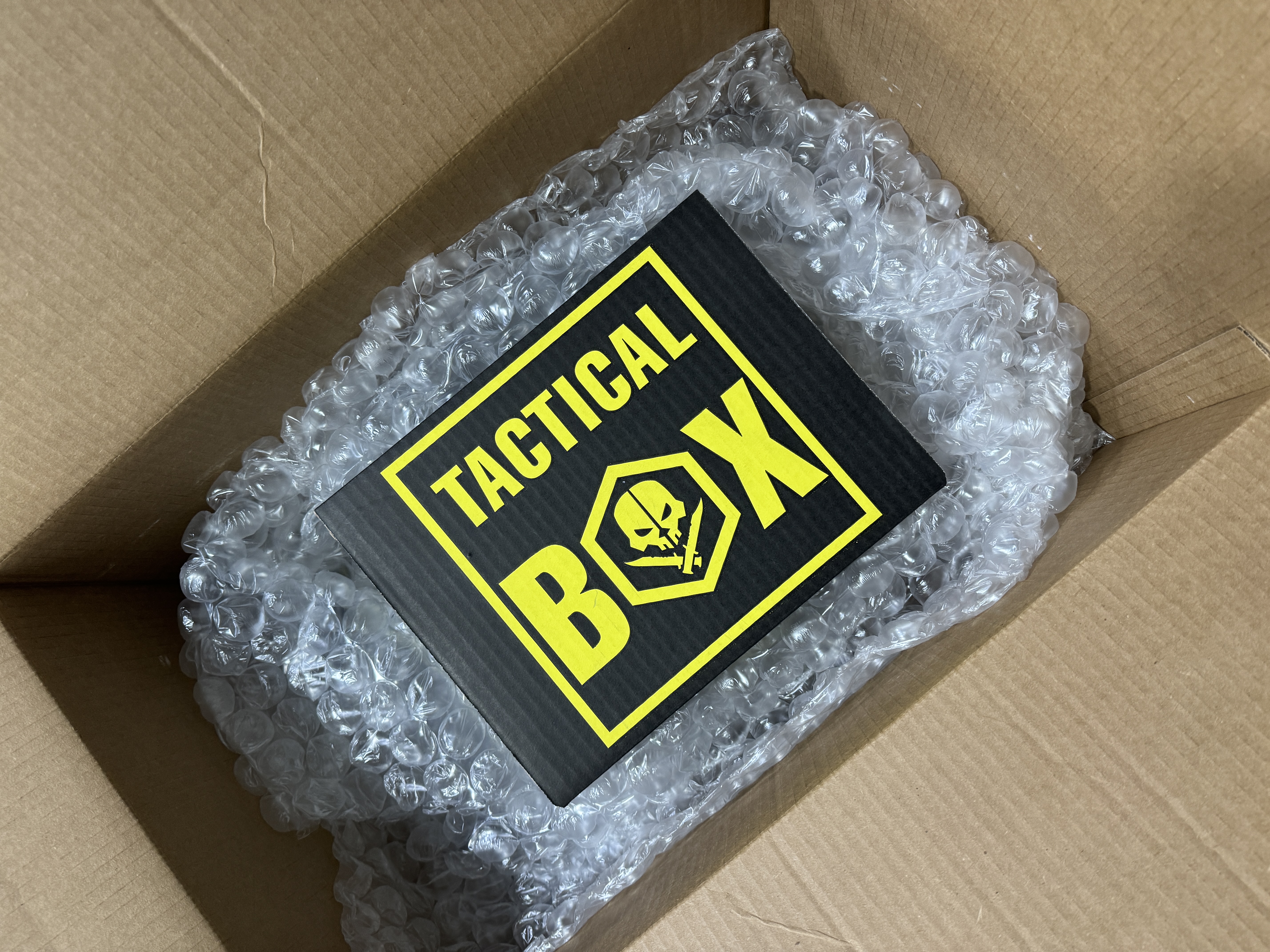 Karen's TacticalBox — bubble-wrapped arrival in shipping box