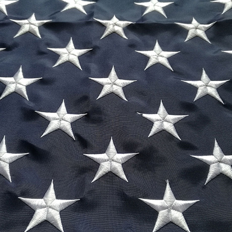 Close view of the embroidered star field on the blue canton